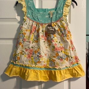 Brand new Girls size 14 multi color dress